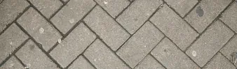 brick sidewalk with gum